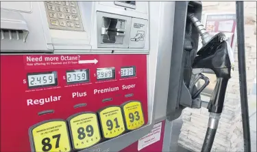  ?? JOHN RAOUX — THE ASSOCIATED PRESS ?? A gas pump reflecting current prices is seen in Orlando, Fla. The Consumer Price Index increased slightly in June with a big rise in gas prices.