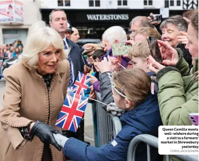  ?? CHRIS JACKSON/PA ?? Queen Camilla meets well-wishers during a visit to a farmers’ market in Shrewsbury yesterday