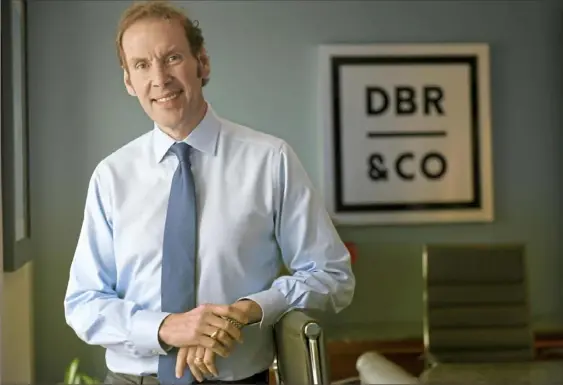  ?? Steve Mellon/Post-Gazette ?? David Root, founder and CEO of DBR &amp; Co., in his firm’s offices in the Koppers Building, Downtown.