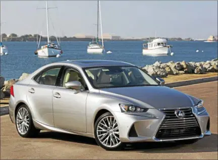  ??  ?? The 2018 Lexus IS 300has a nice stance and works very hard to appeal to those Millennial­s who have discovered that driving is fun.