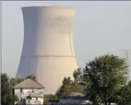  ?? AMY SANCETTA ?? The cooling tower of the Davis-Besse Nuclear Power Station in Oak Harbor is shown.