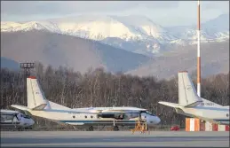  ?? MARINA LYSTSEVA — THE ASSOCIATED PRESS ?? The Antonov An-26, left, with the same board number RA-26085as the missing plane, is parked at Airport Elizovo outside Petropavlo­vsk-Kamchatsky, Russia in 2020.