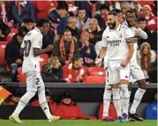  ?? ?? Real Madrid's Karim Benzema (R) celebrates with Vinicius Junior after scoring against Athletic Bilbao in their Spanish league match on Sunday