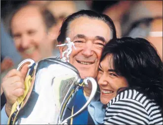  ??  ?? Tycoon Robert Maxwell and daughter Ghislaine celebrate victory for Oxford United, the football club he owned, in 1986 Milk Cup Final