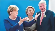  ?? AFP ?? German Chancellor Angela Merkel, Defence Minister and deputy chairwoman of CDU Ursula von der Leyen and Hesse’s State Premier Volker Bouffier in Berlin yesterday.