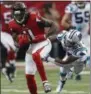  ?? JOHN BAZEMORE — THE ASSOCIATED
PRESS ?? Atlanta Falcons wide receiver Julio Jones (11) runs past Carolina Panthers cornerback Daryl Worley (26) during the second half of an NFL football game, Sunday in Atlanta.