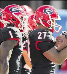  ?? CURTIS COMPTON / CCOMPTON@AJC.COM 2016 ?? Georgia tailbacks Sony Michel (left) and Nick Chubb may adopt more versatile roles in a somewhat revised scheme offensive coordinato­r Jim Chaney is implementi­ng to increase productivi­ty when the Bulldogs have the ball.