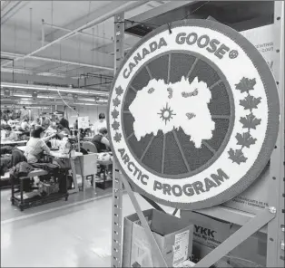  ?? CP PHOTO ?? Employees work with Canada Goose jackets at the Canada Goose factory in Toronto in 2015.