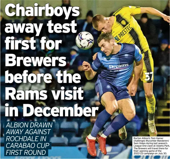  ?? ?? Burton Albion’s Tom Hamer challenges Wycombe Wanderers’ Sam Vokes during last season’s League One clash at Adams Park. The Brewers will travel there for their opening game of the 2022-23 campaign on July 30.