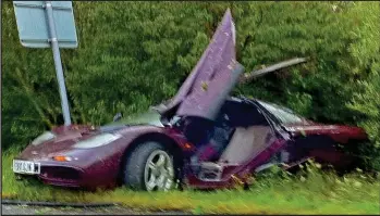  ??  ?? Smash: The supercar after spinning off the road near Peterborou­gh in 2011