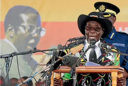  ?? PHOTO: REUTERS ?? President Robert Mugabe speaks to supporters gathered to celebrate his 93rd birthday at Matopas near Bulawayo.