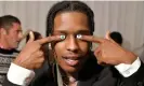  ?? Swan Gallet/WWD/Rex/Shuttersto­ck ?? A$AP Rocky shows off his painted nails at Paris fashion week in 2019. Photograph: