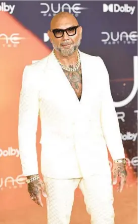  ?? DIMITRIOS KAMBOURIS/GETTY ?? Dave Bautista, who plays the darkly vicious Glossu Rabban in the film, attends the “Dune: Part Two” premiere Feb. 25 in New York City.