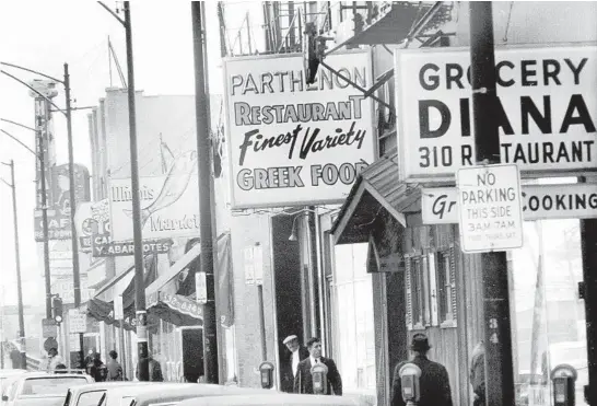  ?? Breaking history since 1847 JOHN AUSTAD/CHICAGO TRIBUNE ?? Chicago’s Greektown in May 1969 was a cluster of a dozen or so businesses at the intersecti­on of Jackson Boulevard and Halsted Street.