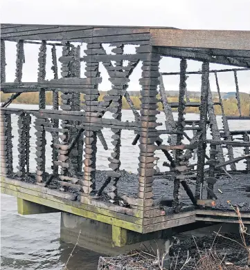  ??  ?? DESTROYED: The charred remains of the popular site at Loch Leven, Kinross-shire.