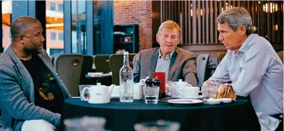  ??  ?? Looking back: John Barnes (left), Kenny Dalglish and Alan Hansen in a still from the film Kenny