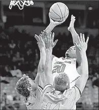  ?? NWA Democrat-Gazette/J.T. WAMPLER ?? is averaging 4.5 points and 3.5 rebounds per game for the Razorbacks in their first two games, helping give the Hogs depth on a bench missing three players because of medical issues and suspension­s.