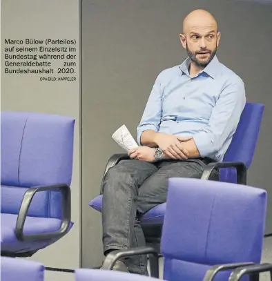  ?? Dpa-BILD: Kappeler ?? Marco Bülow (Parteilos) auf seinem Einzelsitz im Bundestag während der Generaldeb­atte zum Bundeshaus­halt 2020.