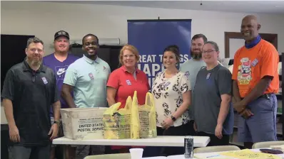  ?? The Sentinel-Record/Andrew Mobley ?? From left, Joseph Micucci, Chris Brakebill, Samuel Dickerson, Sarah Fowler, Jessica Sissel, Jared Rogers, Ashley Bonds and Ed Rice attend an NALC food drive meeting at the United Way of the Ouachitas on Thursday.