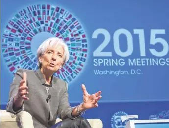  ?? STEVE JAFFE, EUROPEAN PRESSPHOTO AGENCY ?? Internatio­nal Monetary Fund Managing Director Christine Lagarde discusses the global economy Thursday in Washington.