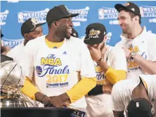  ?? Scott Strazzante / The Chronicle ?? Draymond Green (front) and his teammates could be wearing T-shirts and hats commemorat­ing a 16-0 postseason blitz.