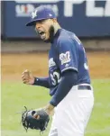  ?? Ap / charlie riedel ?? Jeremy Jeffress cargó con el revés de los Cerveceros de Milwaukee.