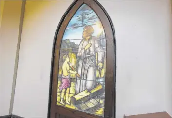  ?? Paul Buckowski / Times Union ?? A view of a stained glass window at Bethesda Episcopal Church on Aug. 12, in Saratoga Springs. The stained glass window shows a scene of a young Jesus Christ and his father Joseph.