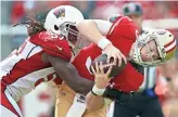  ??  ?? Cardinals linebacker Josh Bynes sacks San Francisco quarterbac­k C.J. Beathard Sunday. Big plays are needed for the Arizona defense to be competitiv­e.