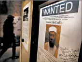  ?? SPENCER PLATT/GETTY ?? The new exhibition “Revealed: The Hunt for Bin Laden” opened in November at the 9/11 Memorial & Museum.