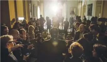  ?? Andrew Burton, Getty Images ?? Sen. Ted Cruz, R-Texas, talks to members of the media at the Capitol after he met with GOP senators on a bipartisan solution to the budget and debt-limit impasse.