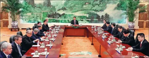  ?? WU ZHIYI / CHINA DAILY ?? President Xi Jinping meets with heads of foreign delegation­s attending the 13th meeting of Security Council Secretarie­s of the Shanghai Cooperatio­n Organizati­on at the Great Hall of the People in Beijing on Tuesday. He called for moving SCO security...