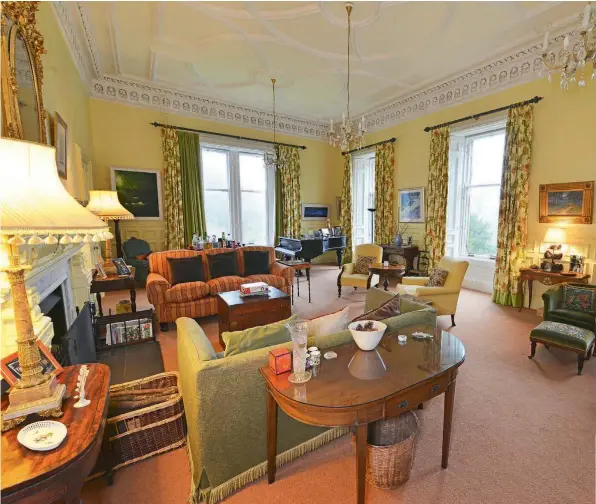  ??  ?? Clockwise from above: The castle’s main room; its handsome staircase; the impressive Scots Baronial exterior.