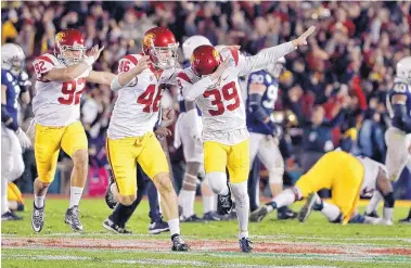  ?? AP FILE ?? Two years ago USC had a grand time celebratin­g its Rose Bowl victory over Penn State. This year Ohio State and Washington will play.