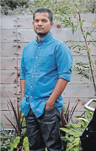  ?? PRESTON GANNAWAY NYT ?? Nik Sharma at his home in Oakland, Calif. His deeply personal debut cookbook, “Season: Big Flavors, Beautiful Food,” chronicles his journey from his childhood in Mumbai, India, to his current life.