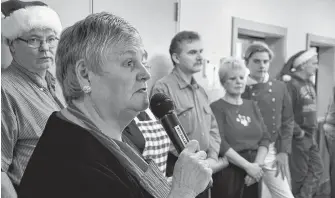  ?? LAWRENCE POWELL PHOTOS ?? Maureen Publow welcomes everyone to Christmas Dinner at the fire hall in Bridgetown Christmas Day in a previous edition of the event. The free Christmas dinner for anybody who wants it is back again this year. Maureen and Jerry Publow have been hosting the event since 2015.