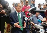 ?? SCOTT OLSON / GETTY IMAGES ?? Gov. Greg Abbott, speaking Sunday at Santa Fe High, wants “the best solutions to make our schools more secure” in talks.