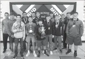  ?? CONTRIBUTE­D PHOTO ?? Red Bud wrestlers pose for a photo with their first-place trophy after winning the BGMSAA Traditiona­l championsh­ip last Saturday.