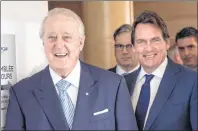  ?? CP PHOTO ?? Quebecor chairman Brian Mulroney and president and CEO Pierre Karl Peladeau arrive for the media company’s annual meeting Tuesday in Montreal.