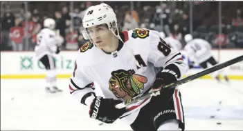  ?? NOAH K. MURRAY/AP ?? CHICAGO BLACKHAWKS RIGHT WING PATRICK KANE (88) skates before an NHL hockey game against the New Jersey Devils, Tuesday, Dec. 6, 2022, in Newark, N.J.