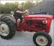  ?? SUBMITTED ?? Nick Kustala and his tractor just finished clearing brush from 15acres that will be picnic grounds for carryout from his new Bula Ghost Kitchens and The Farmer Butcher Chef Bistro.