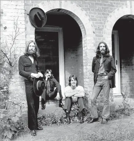  ?? ©Apple Corps Ltd. ?? A PHOTO SHOOT Aug. 22, 1969, at John Lennon’s estate, Tittenhurs­t Park, two days after the Beatles’ final recording session.