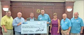  ?? Adam Cook ?? Catoosa County received a $7,475 safety grant, and was presented with the funds during the Aug. 6 Board of Commission­er’s meeting. From left; Commission­ers Jeff Long, Chuck Harris, Commission Chairman Steven Henry, ACCG Insurance Marketing and Field Service Representa­tive Joe Dan Thompson, County Manager Alisha Vaughn, Commission­ers Jim Cutler and Charlie Stephens.