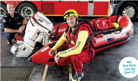  ?? PHOTO: NEV MADSEN ?? ON BOARD: Queensland Fire and Emergency Services swift -water firefighte­r (back, left) Mark Haddow and swift water technician Shane Cartwright with one of the new water craft.