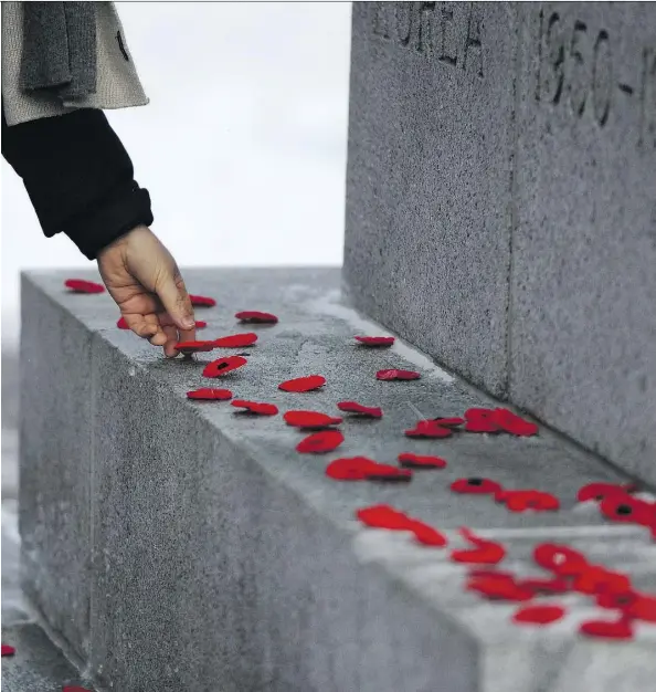  ?? FILES ?? City hall hosts its annual Remembranc­e Day ceremony Saturday starting at 10:15 a.m. The service is followed by a procession to the cenotaph.