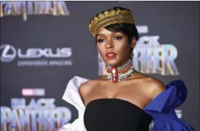  ?? PHOTO BY CHRIS PIZZELLO — INVISION — AP, FILE ?? Musician/actress Janella Monae arrives at the premiere of the film “Black Panther,” at The Dolby Theatre in Los Angeles. Featuring a predominan­tly black cast, the film that is an ode to Africa - with costuming and sets heavily inspired by African...