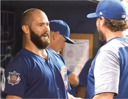  ?? | GETTY IMAGES ?? Jake Arrieta, sporting a new buzz cut, gave up one run and six hits in seven innings. He struck out three and walked none.