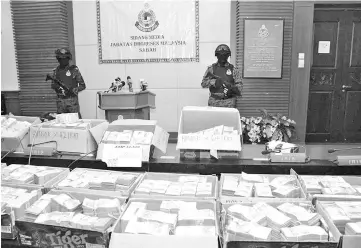  ??  ?? Immigratio­n Department discovered RM13.5 million of cash during an anti-vice raid at a spa in a hotel in Kota Kinabalu on November 24.