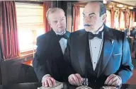  ??  ?? Toby Jones as Ratchett and David Suchet as Poirot in Murder on the Orient Express