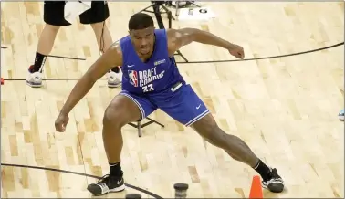  ?? CHARLES REX ARBOGAST — THE ASSOCIATED PRESS ?? NBA prospect EJ Liddell participat­es in the 2022NBA Draft Combine on May 18. There are a lot of people who think Liddell would look good in a Sixers uniform.