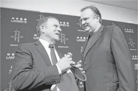  ??  ?? Looking at early returns, the partnershi­p between owner Tilman Fertitta, left, and general manager Daryl Morey has resulted in nothing but success for the Rockets.